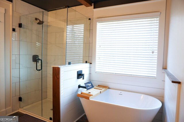 793 Round Tree Ct, Lawrenceville, GA 30045 - full bath featuring a soaking tub and a shower stall