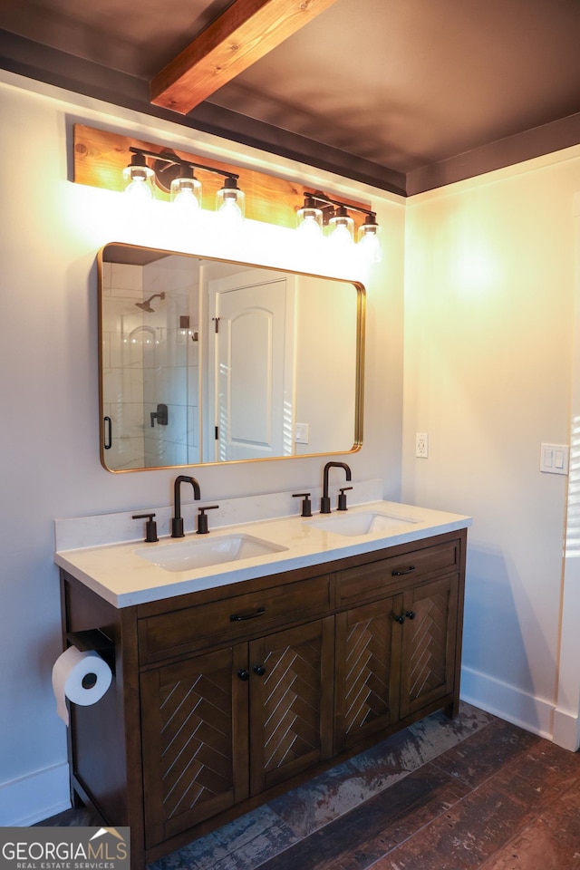 793 Round Tree Ct, Lawrenceville, GA 30045 - full bathroom featuring double vanity, a shower stall, wood-type flooring, and a sink
