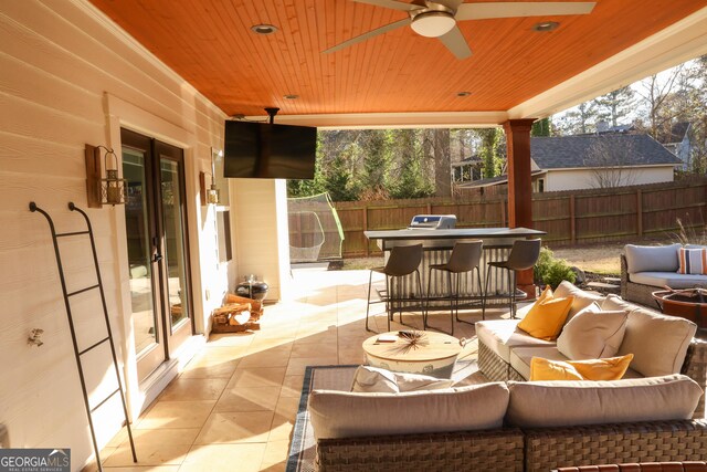 793 Round Tree Ct, Lawrenceville, GA 30045 - view of patio / terrace featuring an outdoor hangout area, ceiling fan, and fence