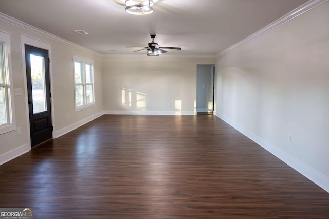 interior space featuring ornamental molding, visible vents, and dark wood finished floors