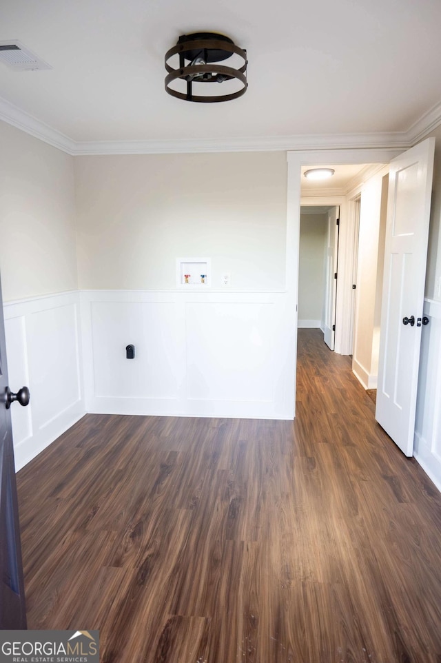 washroom featuring washer hookup, dark wood finished floors, visible vents, ornamental molding, and laundry area