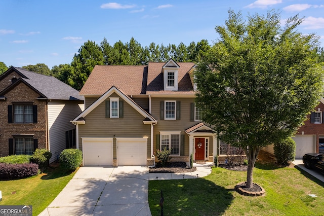 view of front of property with concrete driveway and a front yard