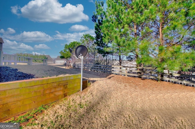 view of yard with fence