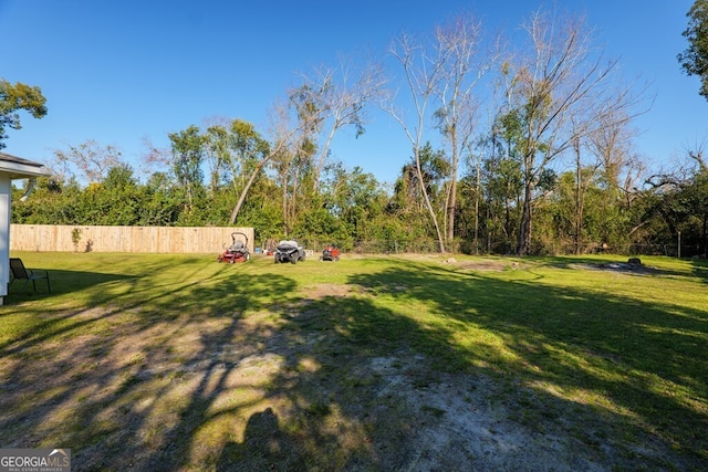 view of yard featuring fence