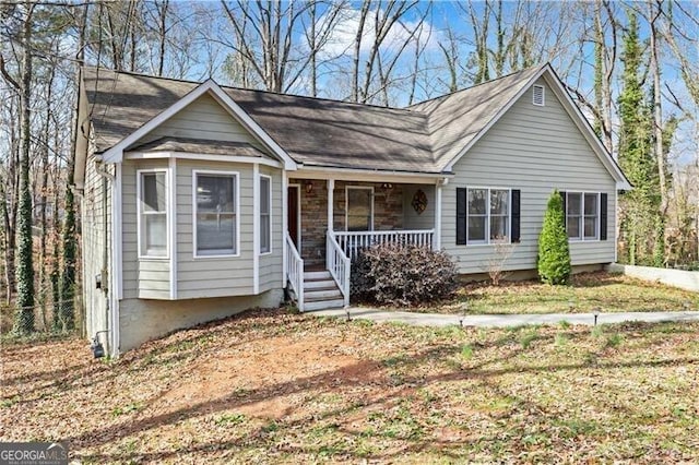 ranch-style house featuring a porch