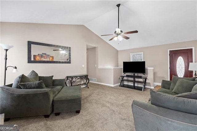 living room featuring vaulted ceiling, carpet flooring, a ceiling fan, and baseboards