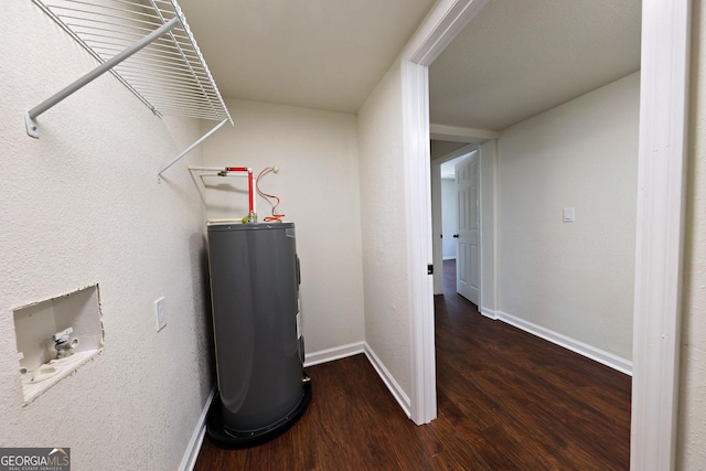 utility room with electric water heater