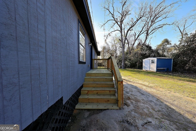 exterior space featuring an outdoor structure and a storage shed