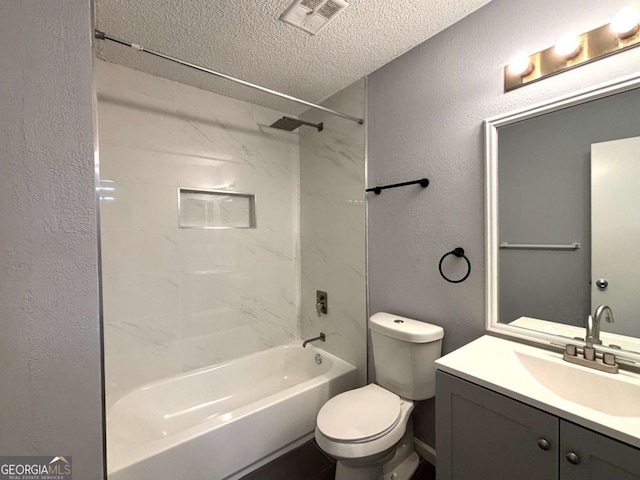 bathroom featuring visible vents, a textured wall, toilet, a textured ceiling, and vanity