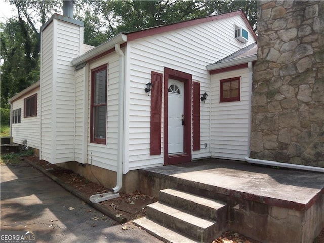 view of front of house with a chimney