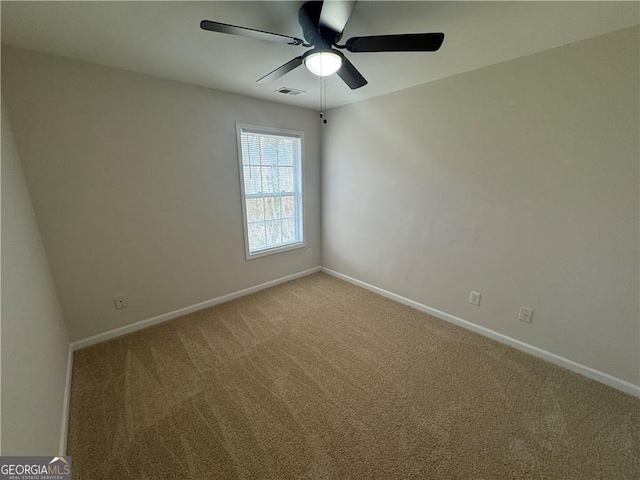 empty room with light carpet, baseboards, and visible vents