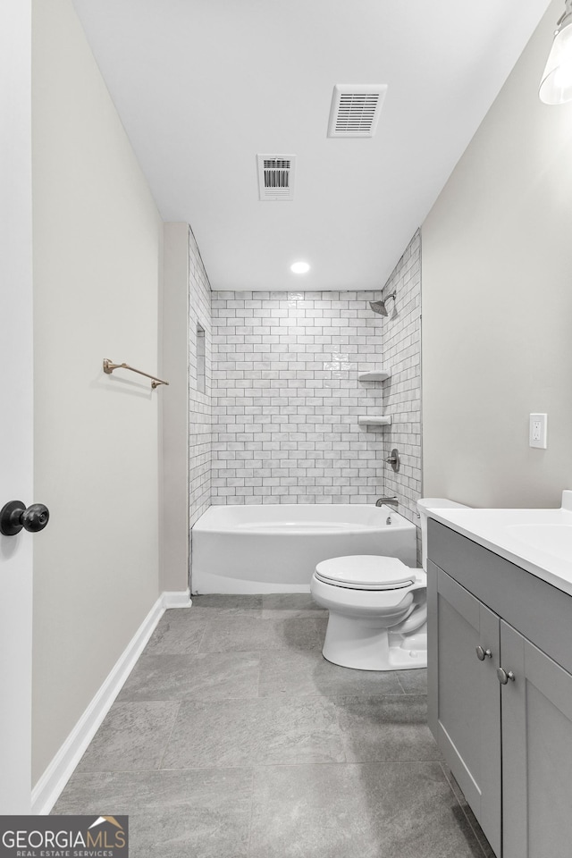 bathroom featuring toilet, washtub / shower combination, visible vents, and vanity