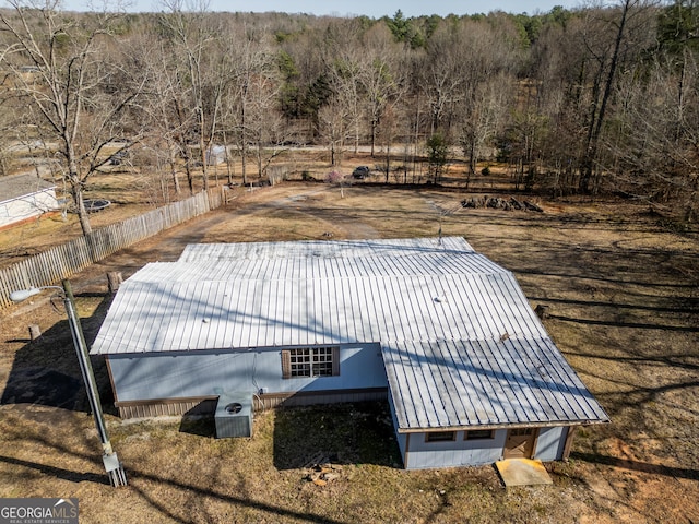 aerial view featuring a view of trees