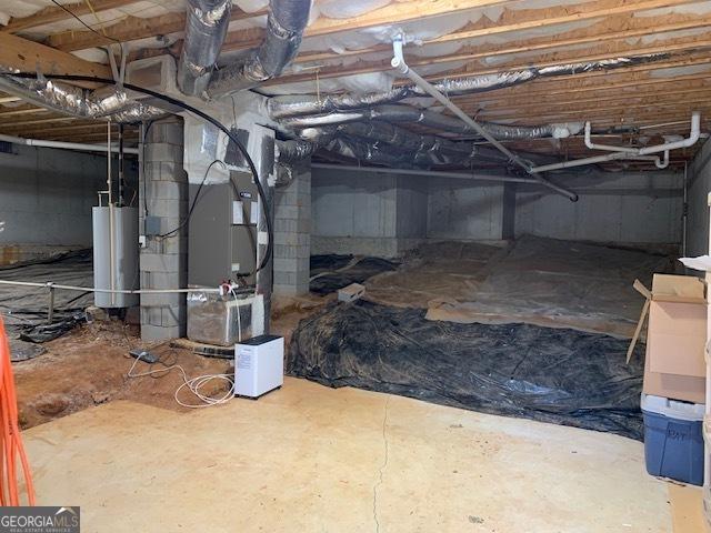 below grade area with crawl space, heating unit, and water heater