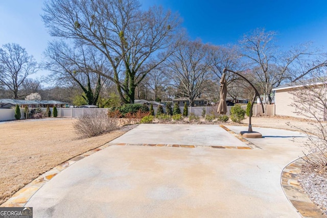 view of patio with fence