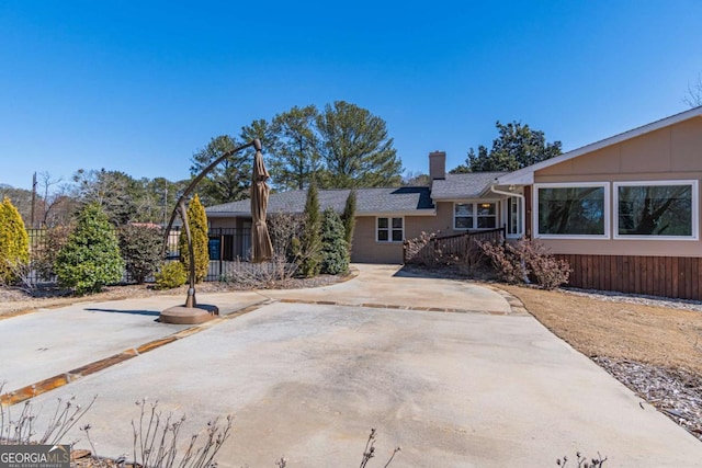 view of front of property with a chimney