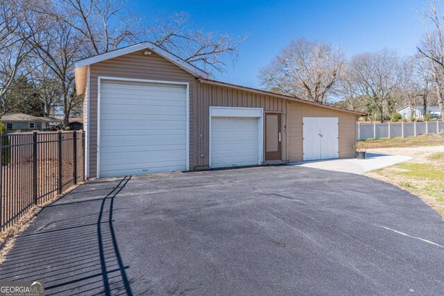 detached garage with fence