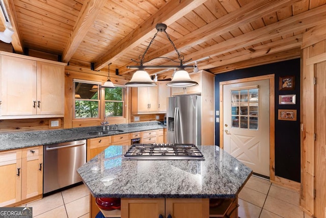 kitchen featuring light tile patterned floors, open shelves, appliances with stainless steel finishes, and a kitchen island