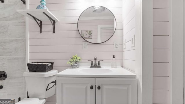 1147 Martin Dr, Cleveland, GA 30528 - bathroom featuring vanity and wood walls