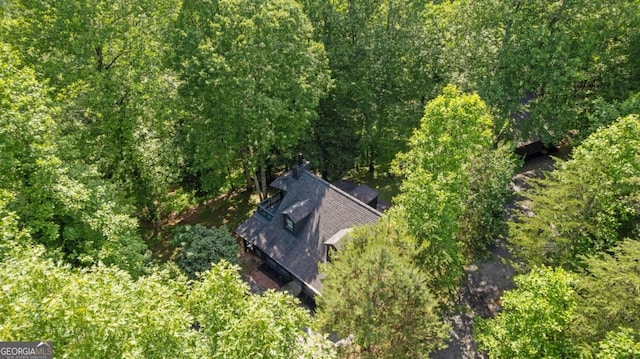 bird's eye view with a view of trees