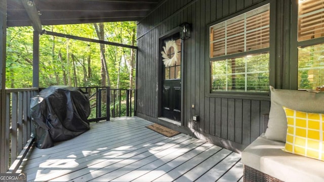 wooden deck featuring grilling area