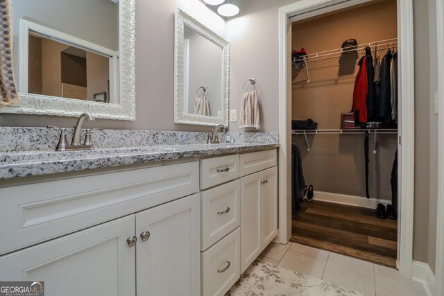 bedroom with baseboards, dark wood finished floors, lofted ceiling, access to exterior, and recessed lighting