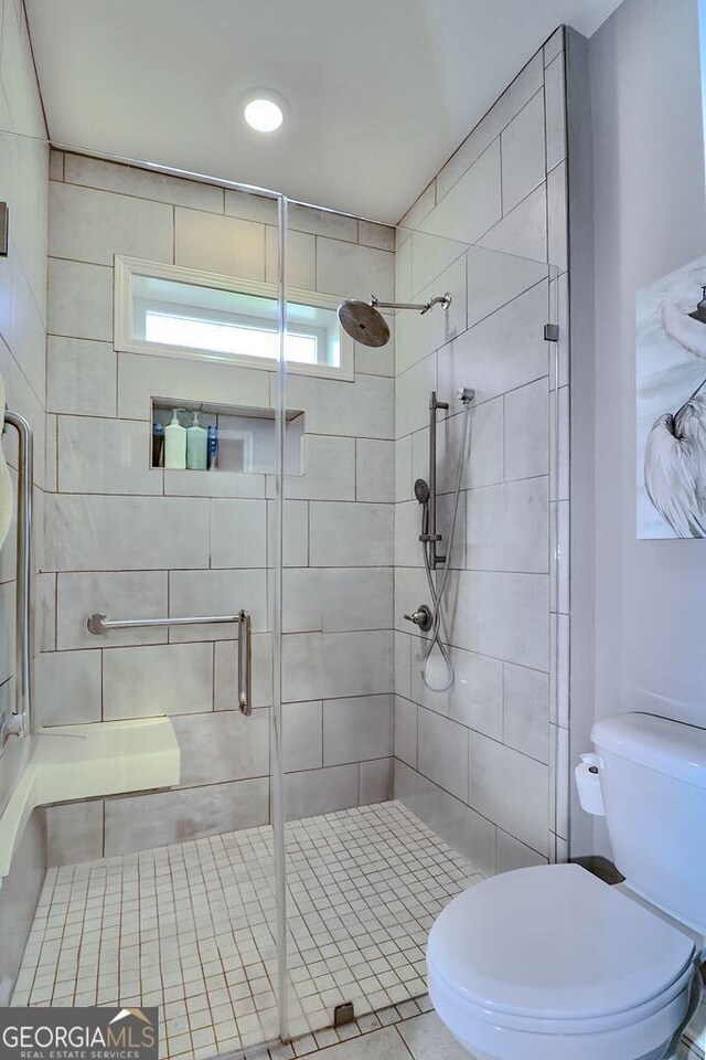 full bathroom featuring double vanity and a sink