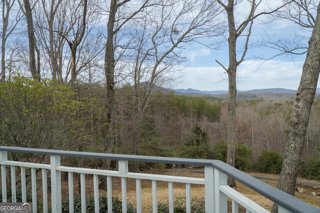 mountain view featuring a forest view