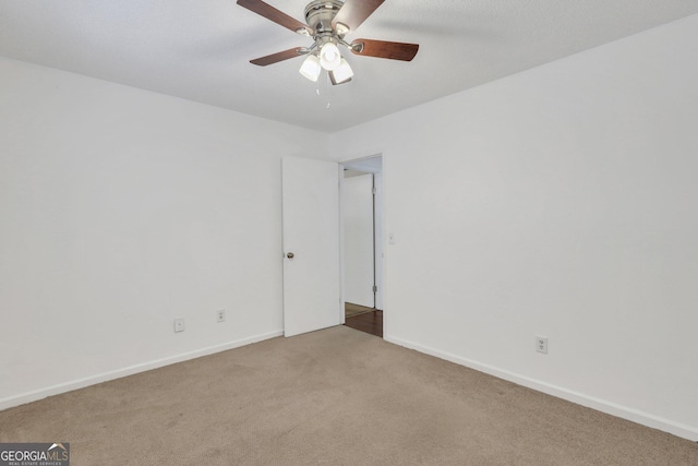 1407 Forest Lake Dr, Hinesville, GA 31313 - empty room with ceiling fan, baseboards, and carpet