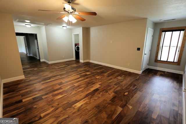 empty room featuring ceiling fan, dark wood-type flooring, and baseboards