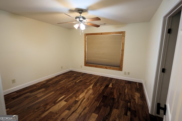 unfurnished bedroom featuring visible vents, baseboards, a ceiling fan, and dark wood-style flooring