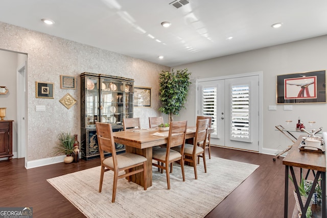 dining space featuring dark wood-style floors, recessed lighting, baseboards, and french doors