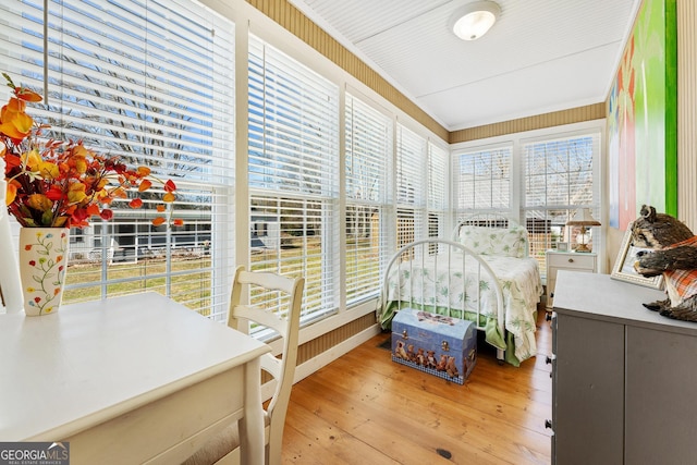 interior space with light wood-style floors and multiple windows