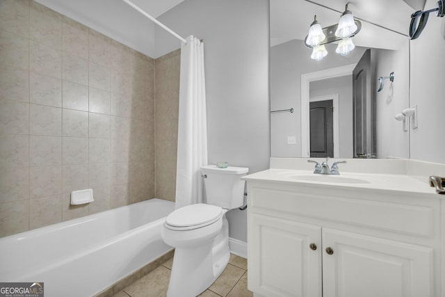 bathroom with tile patterned floors, shower / bath combo with shower curtain, toilet, and vanity