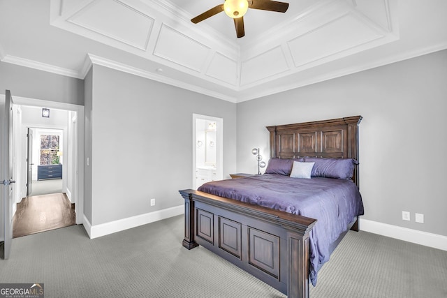 carpeted bedroom with connected bathroom, coffered ceiling, crown molding, and baseboards