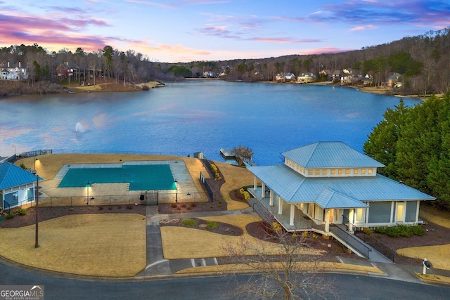 exterior space with a water view