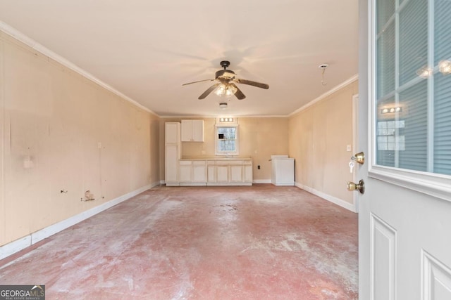 interior space featuring baseboards, concrete floors, a ceiling fan, and crown molding