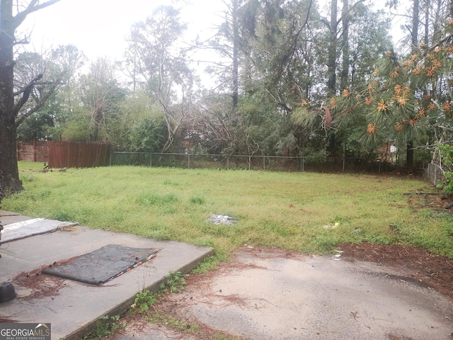 view of yard with fence