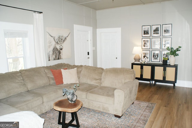 living room with wood finished floors