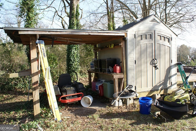 view of shed with a carport