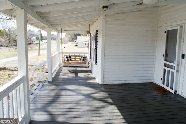 deck with covered porch