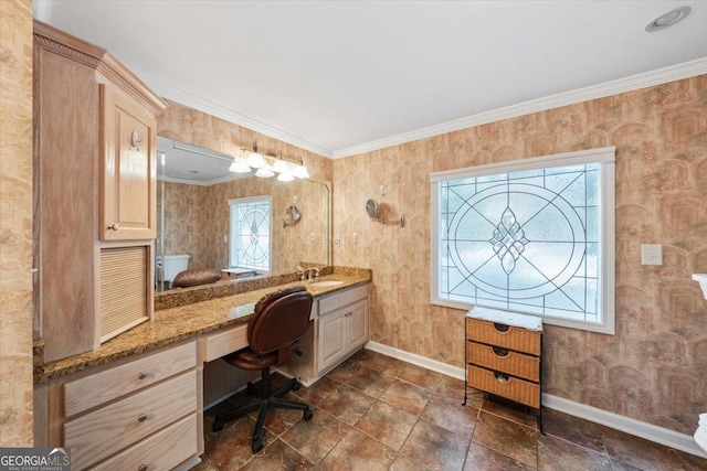 office space with crown molding, built in study area, a sink, baseboards, and wallpapered walls