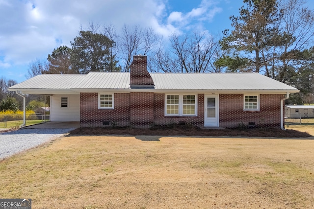 ranch-style house with a front lawn, crawl space, a chimney, and brick siding