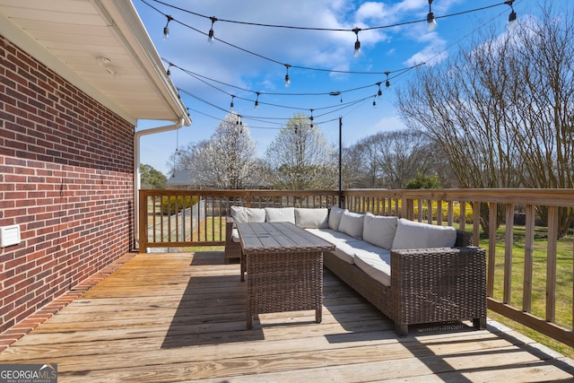 deck with an outdoor hangout area