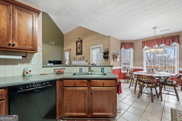 kitchen featuring black dishwasher, visible vents, light tile patterned flooring, a sink, and a peninsula