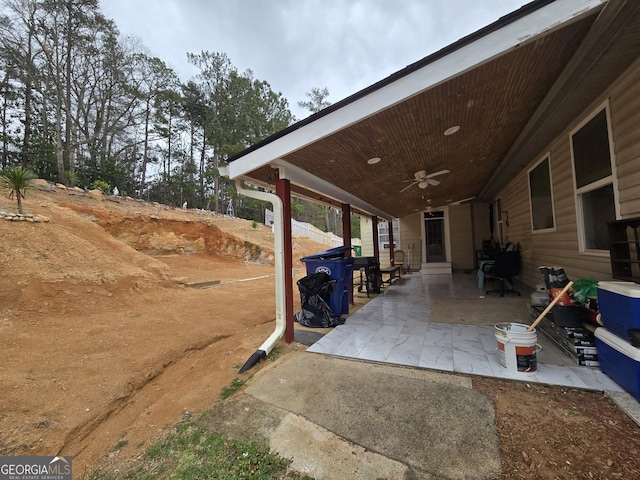 view of patio featuring a ceiling fan