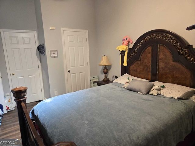 bedroom featuring wood finished floors