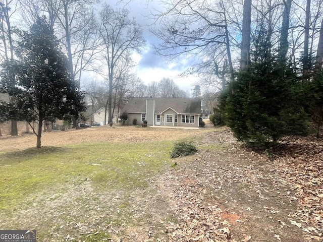 view of front of house with a front lawn