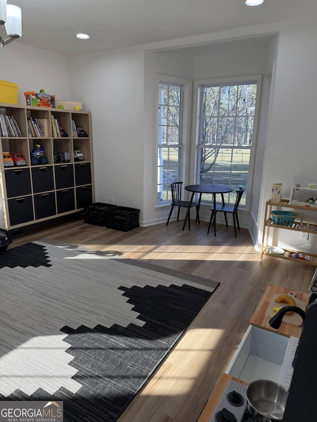 bedroom featuring recessed lighting, baseboards, and wood finished floors