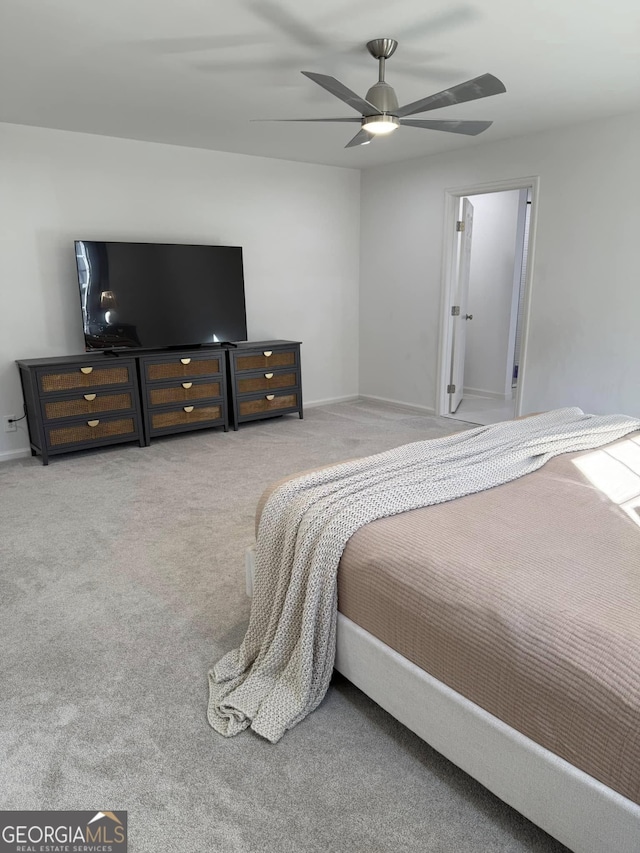 bedroom with carpet, baseboards, and a ceiling fan